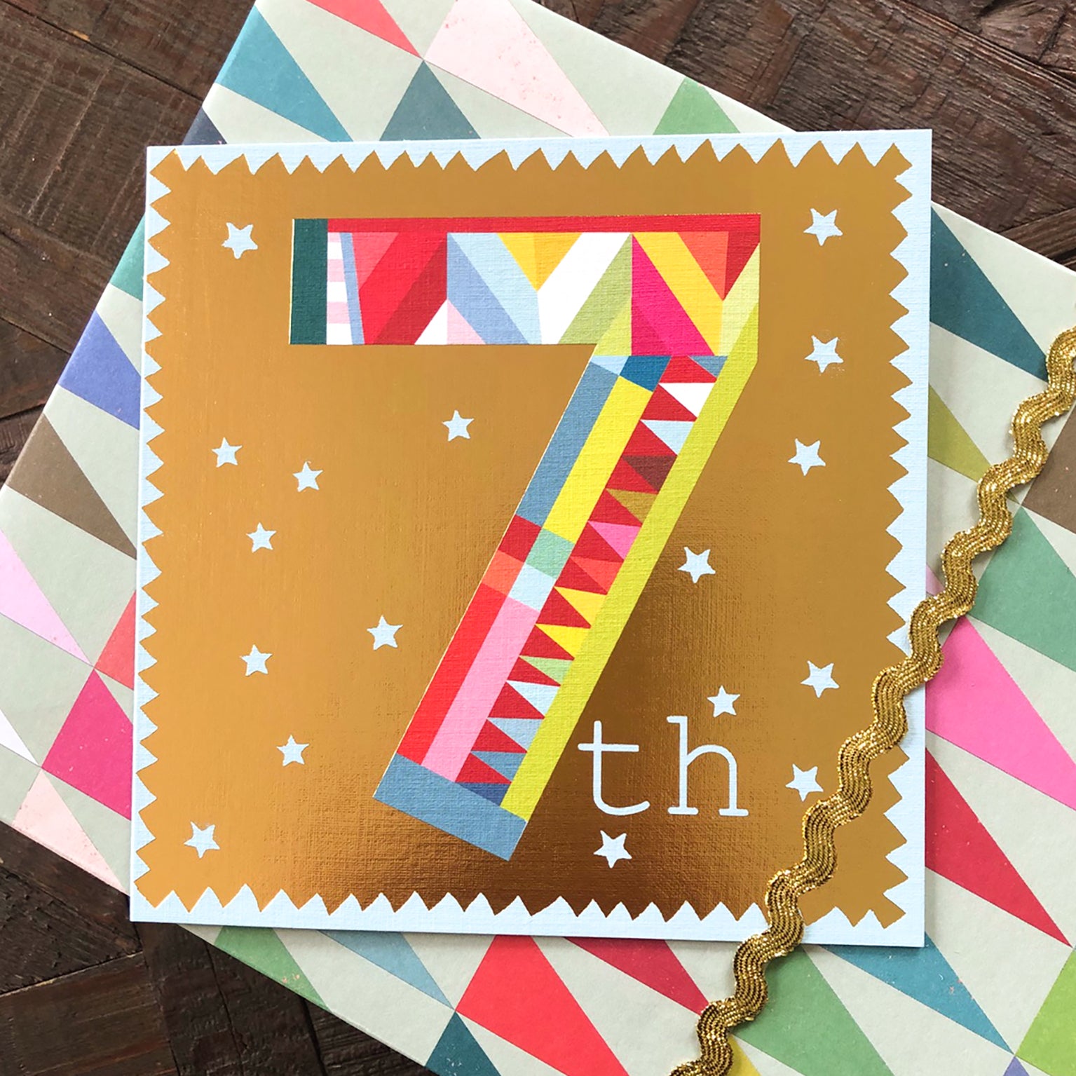 GD07 gold foiled number seven card