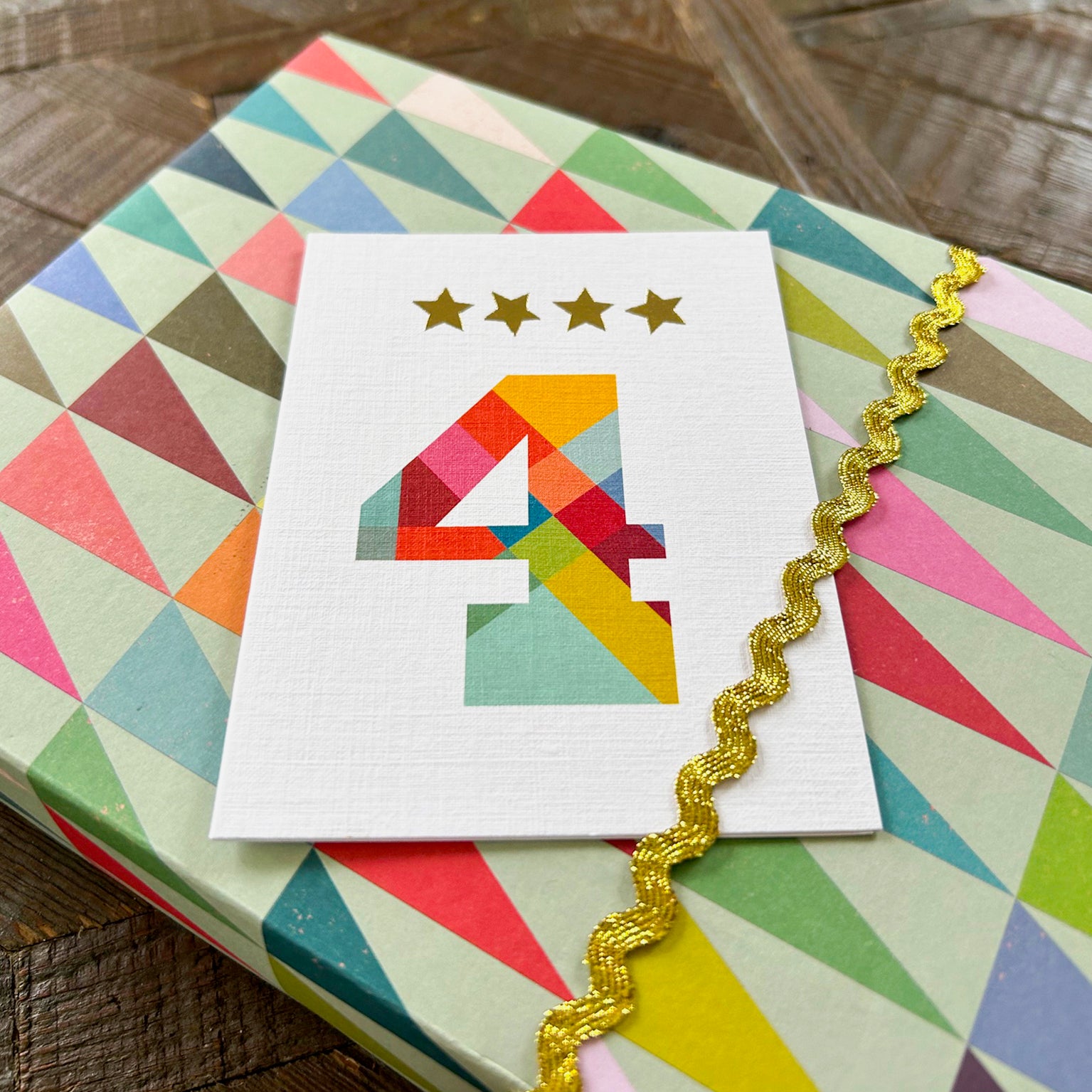 mini gold star number four card