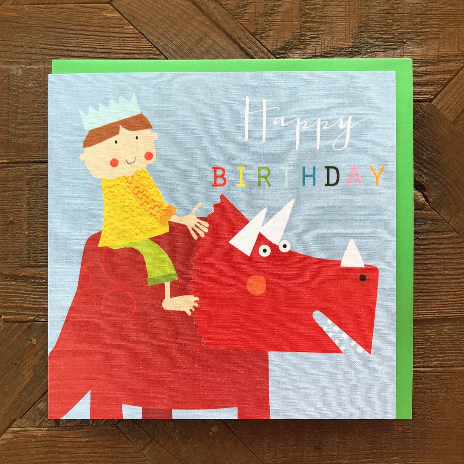 MC20 boy on a dinosaur birthday card