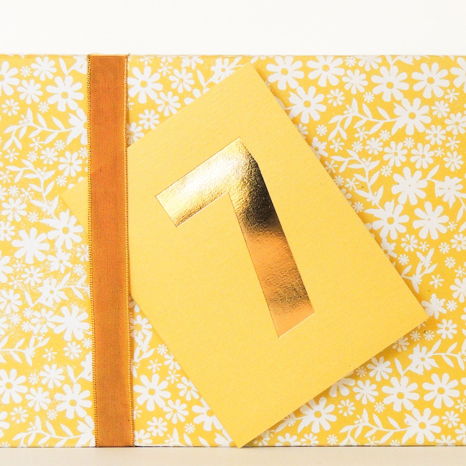 mini gold foiled number seven card