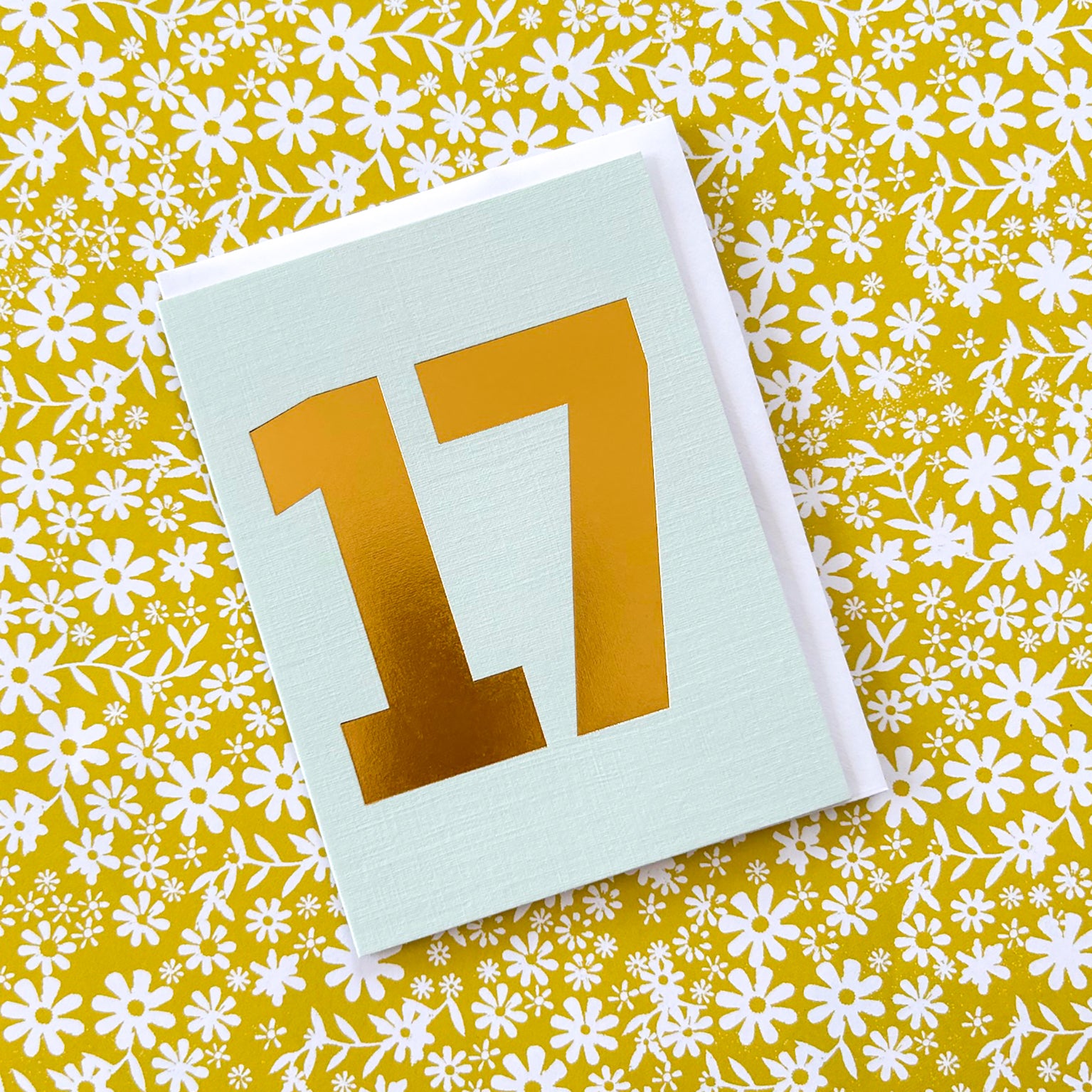 mini gold foiled number seventeen card