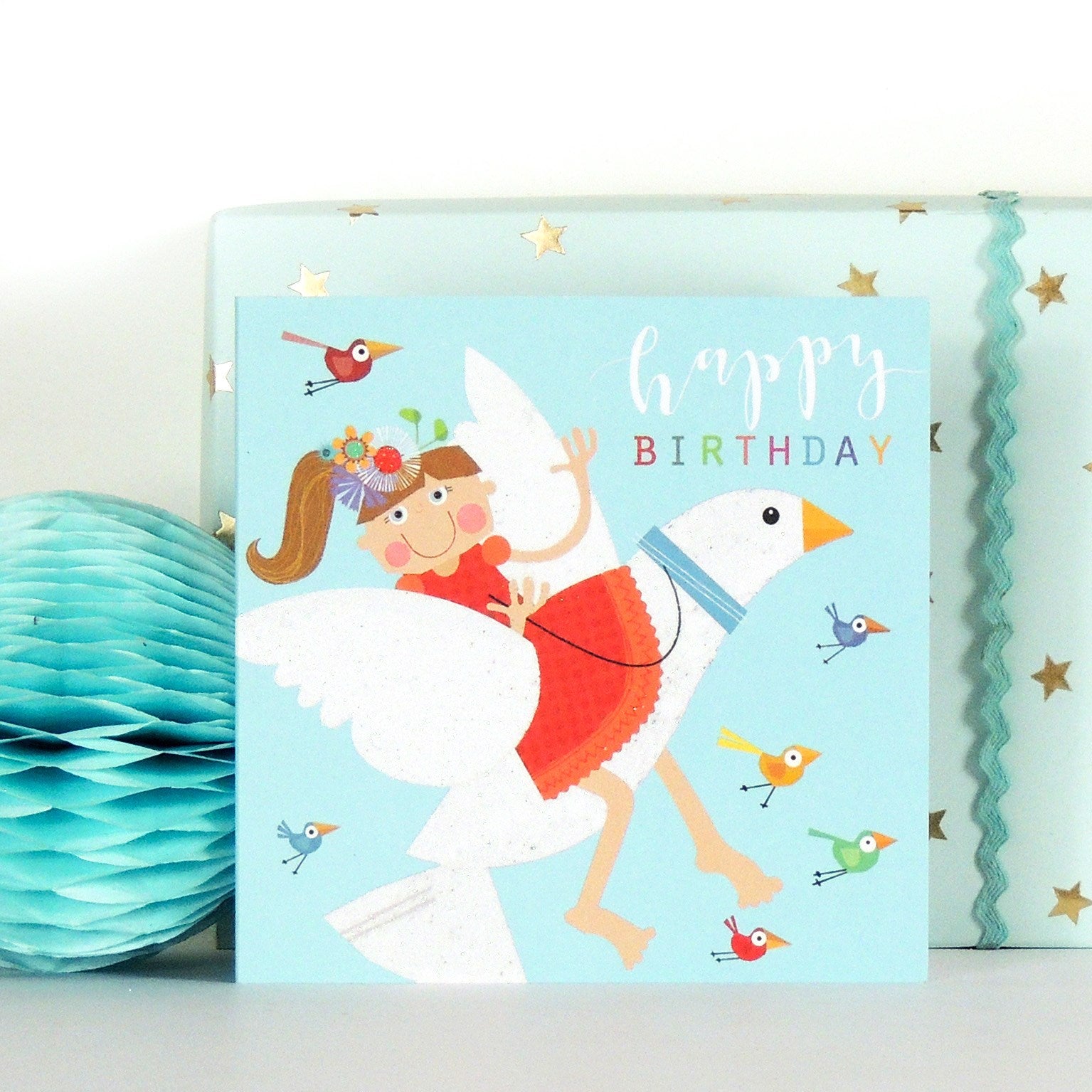 LS05 glittery dove riding birthday card